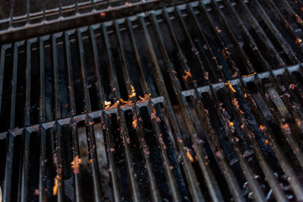 Dirty cooking grate on outdoor gas grill