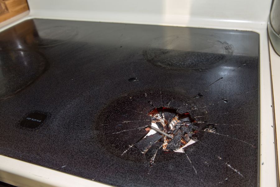Broken electric stovetop due to explosion