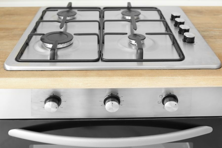 Gas stove from steel in the kitchen