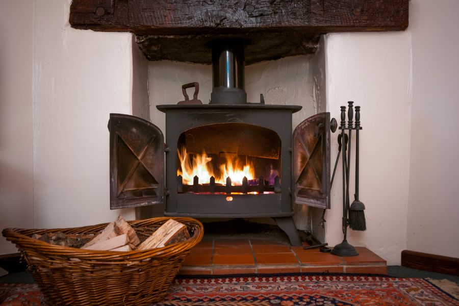 Cozy fireplace with wood burning stove