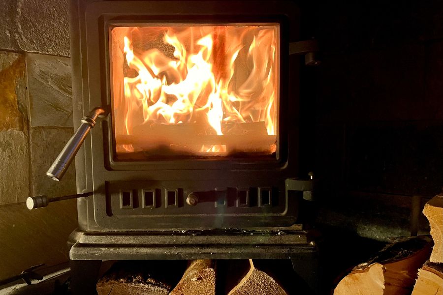 A wood burning stove with open air vent