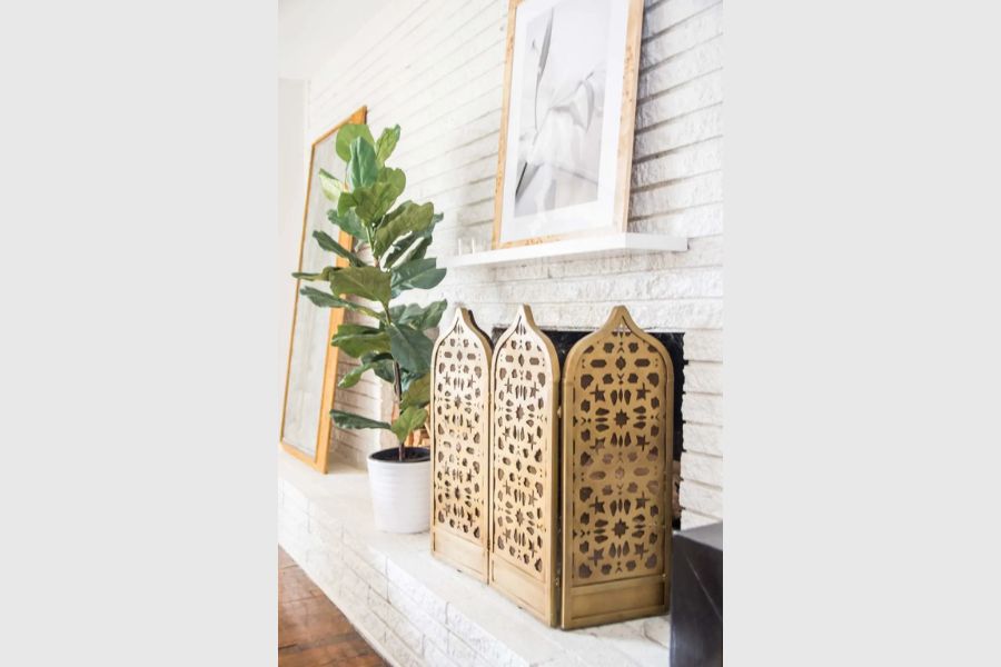 Enhancing the Fireplace with Decorative Screens in an Unused Fireplace