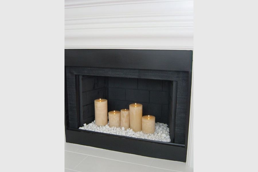 Decorating with Stones and Pebbles in an Empty Fireplace