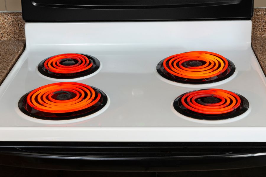 All glowing red burners on electric stove