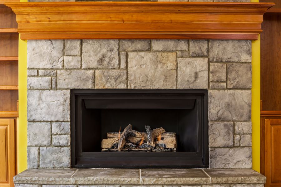 Natural Gas Insert Fireplace with Stone and Wood Hearth