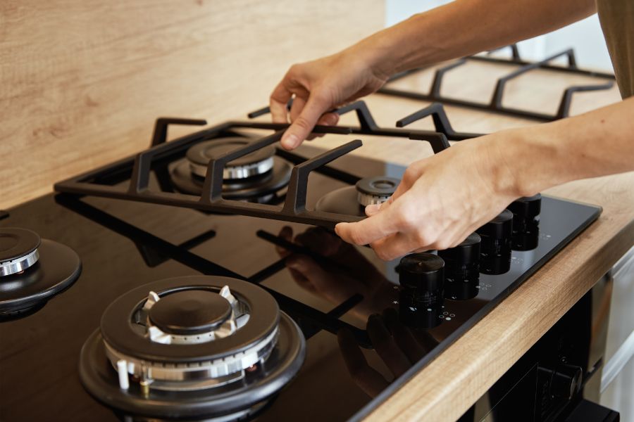 Install cast iron stove grate after cleaning